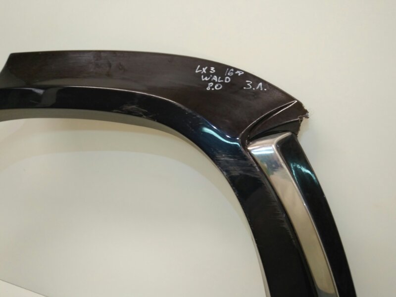 Накладка заднего крыла левого