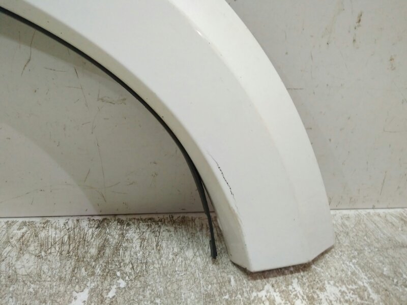 Накладка заднего крыла левого