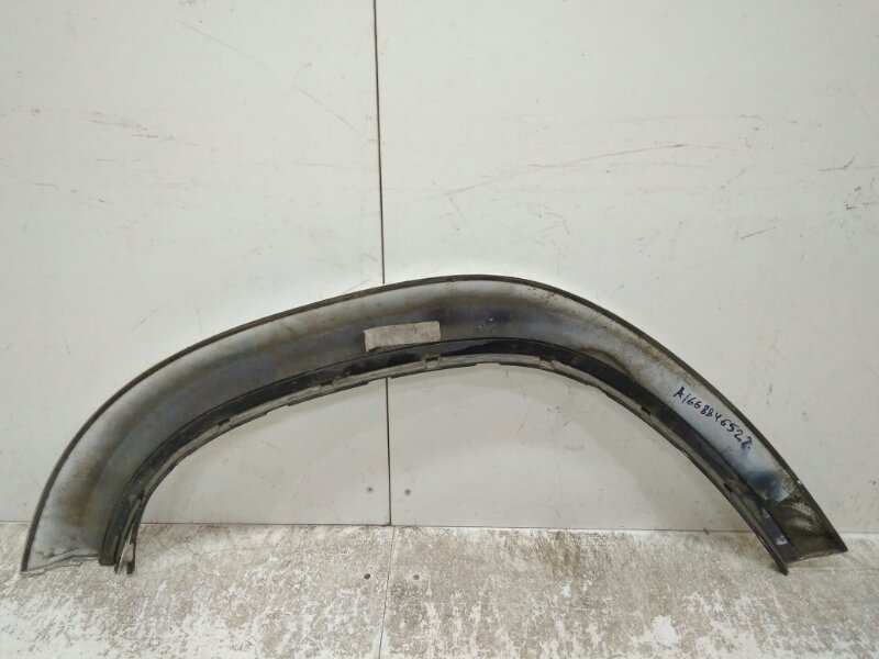 Накладка заднего крыла левого