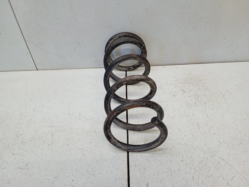 Пружина задняя