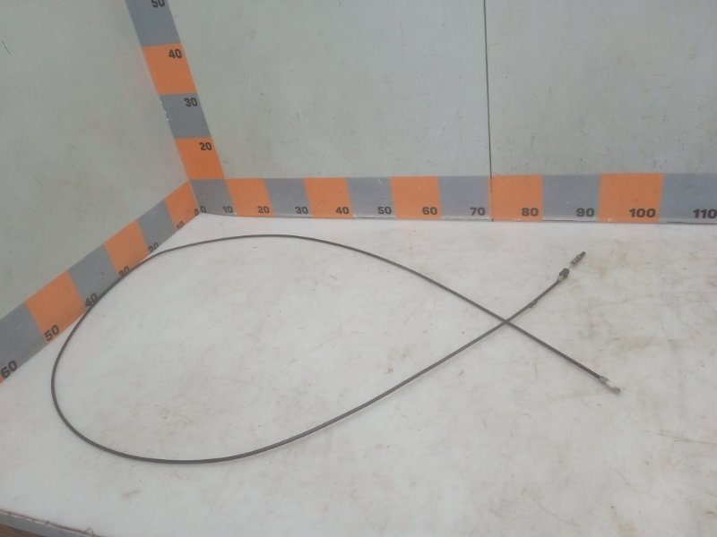 Трос лючка бензобака