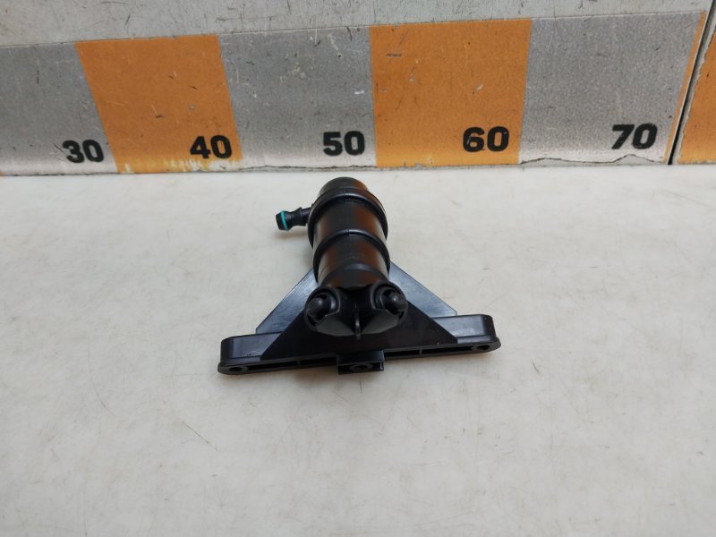 Форсунка омывателя фары