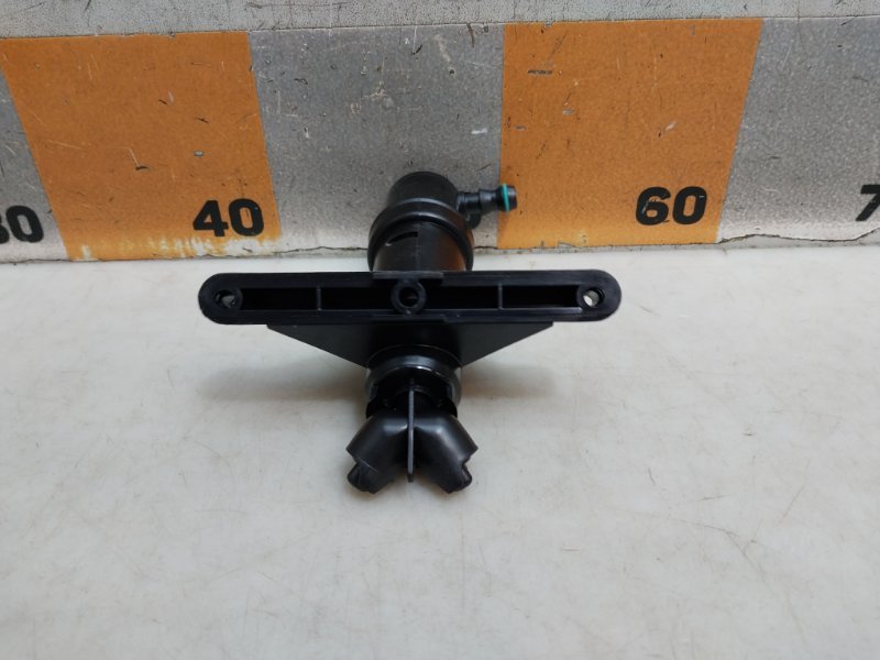 Форсунка омывателя фары