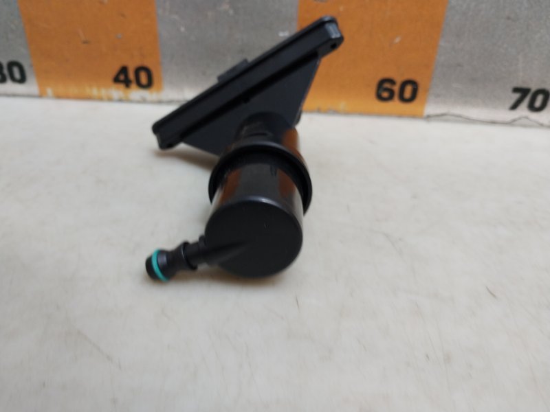 Форсунка омывателя фары