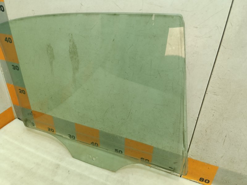 Стекло двери задней левой