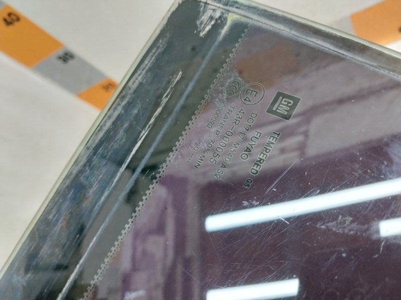 Стекло двери задней левой