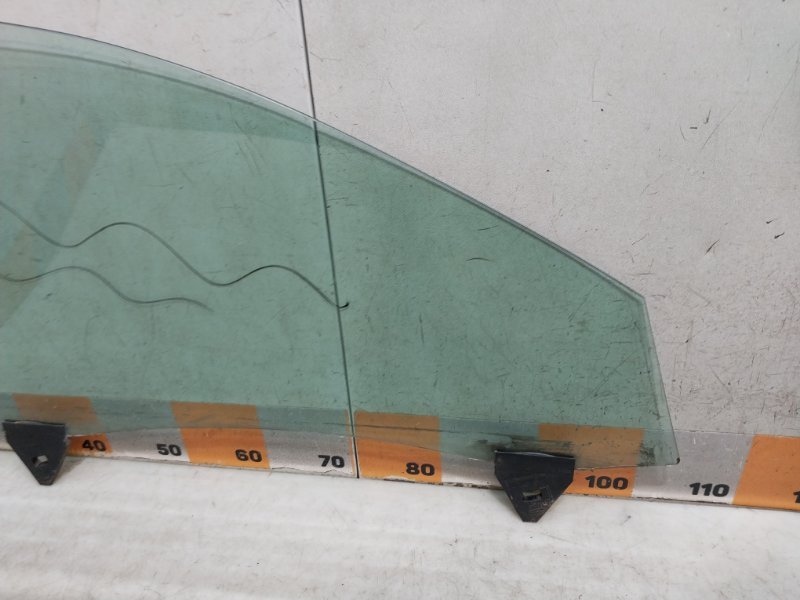 Стекло двери передней левой