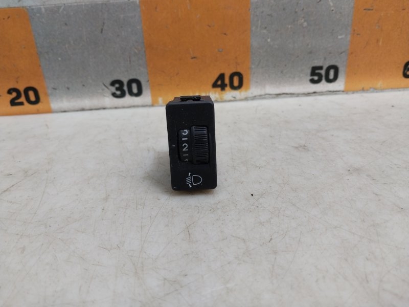 Кнопка корректора фар