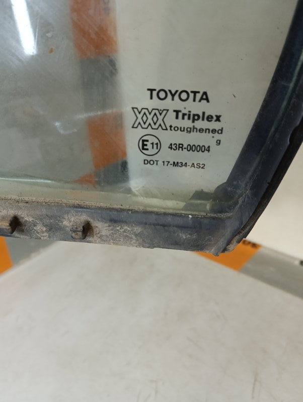 Стекло двери задней левой