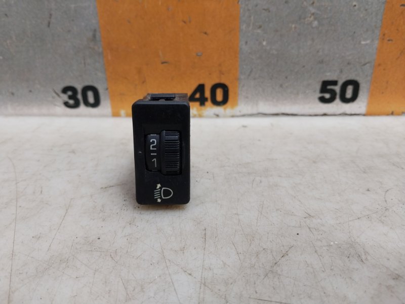 Кнопка корректора фар