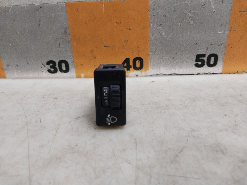 Кнопка корректора фар