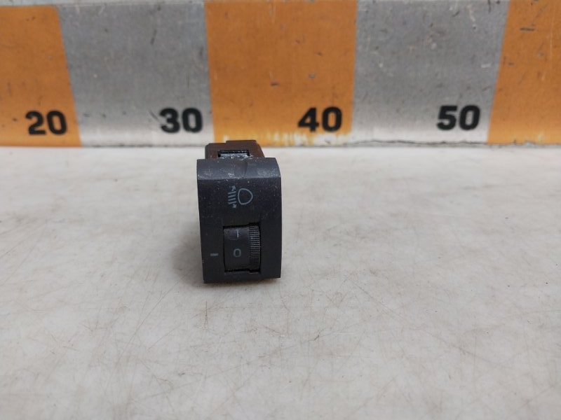 Кнопка корректора фар