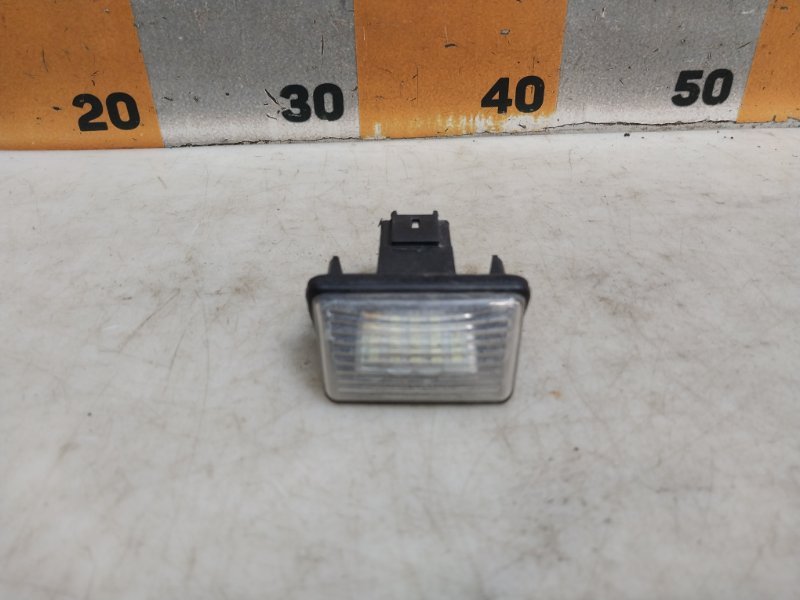 Фонарь подсветки номера