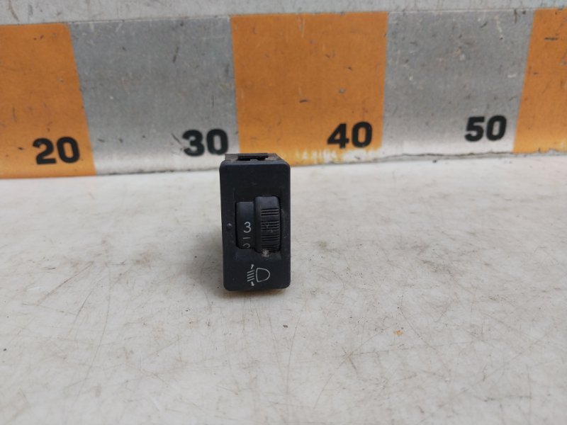 Кнопка корректора фар