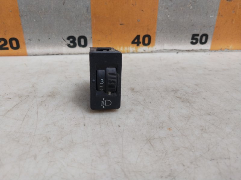 Кнопка корректора фар