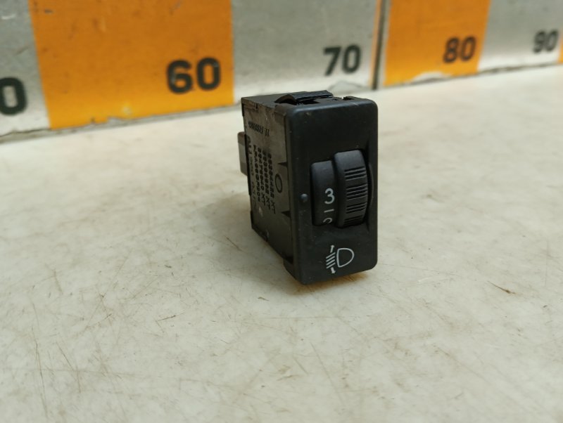 Кнопка корректора фар