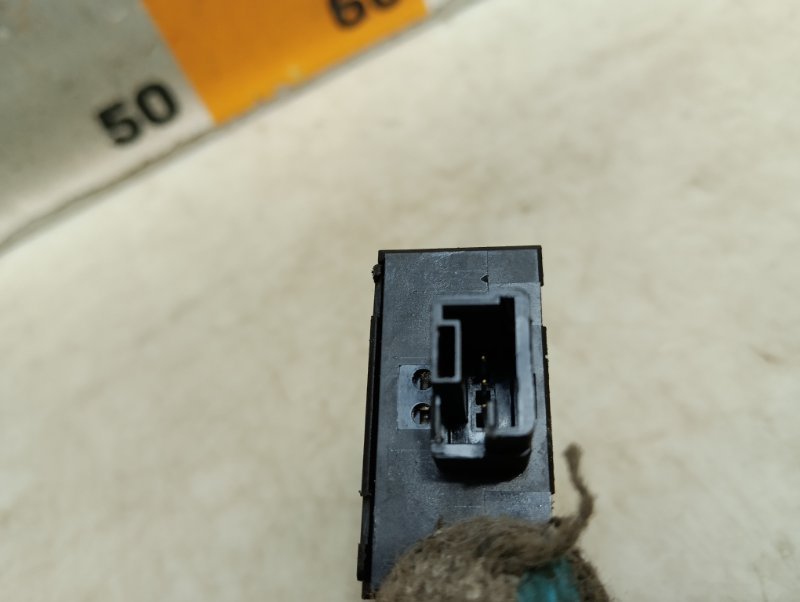 Кнопка корректора фар