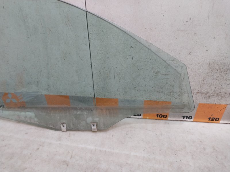 Стекло двери передней левой