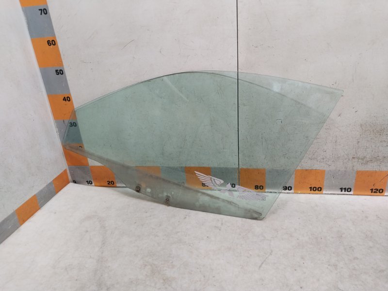 Стекло двери передней левой