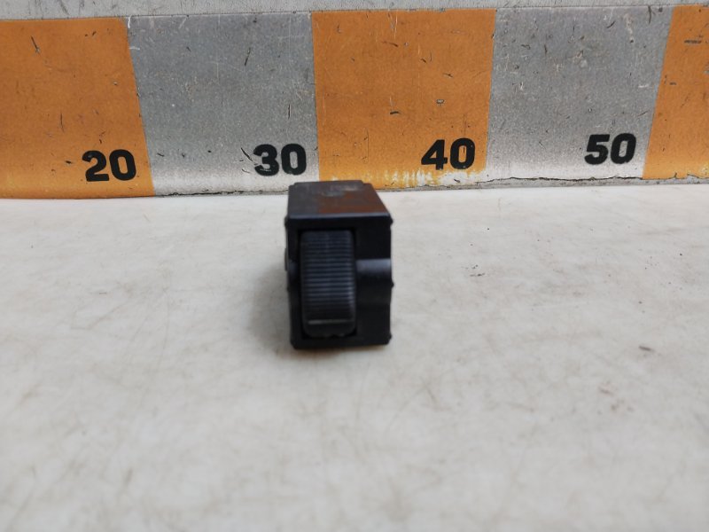 Кнопка корректора фар