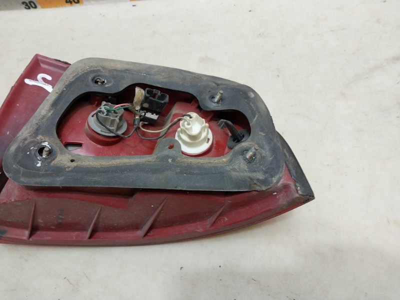 Фонарь задний левый