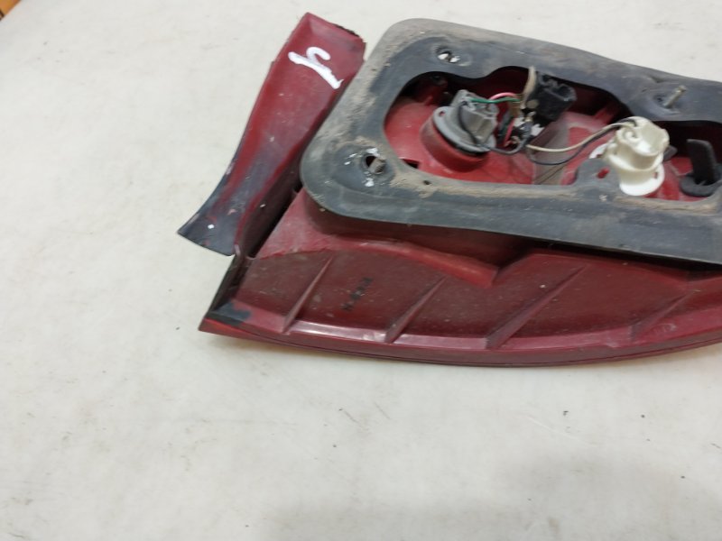 Фонарь задний левый