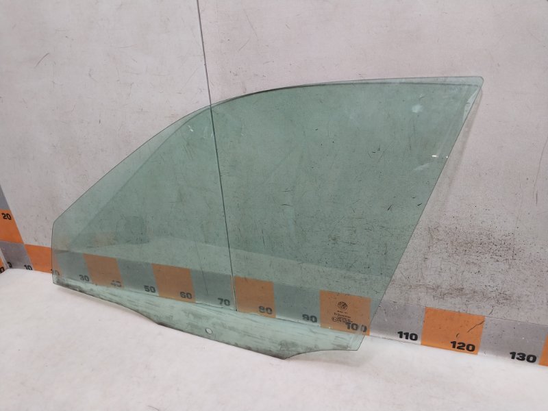 Стекло двери передней левой