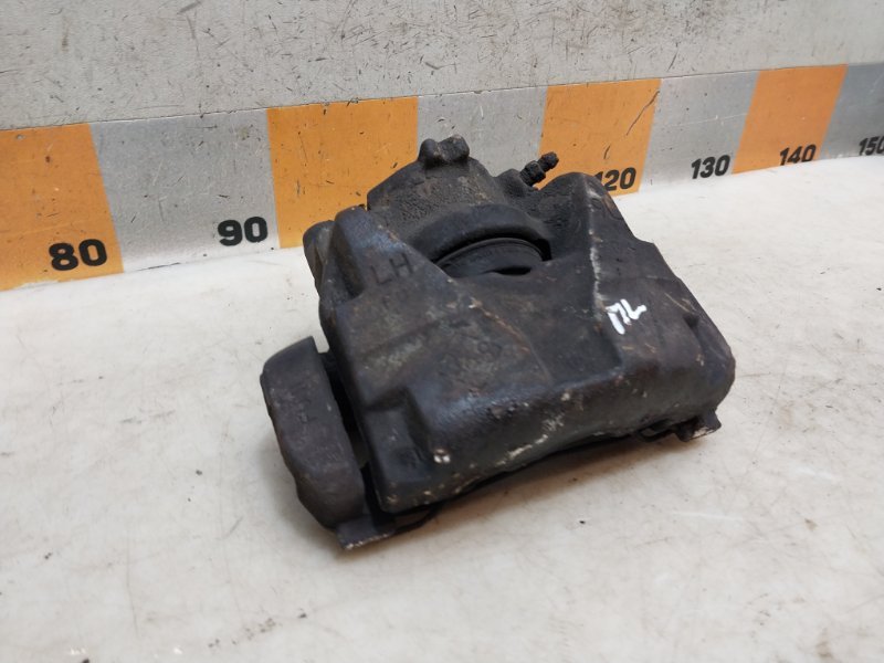 Суппорт передний левый