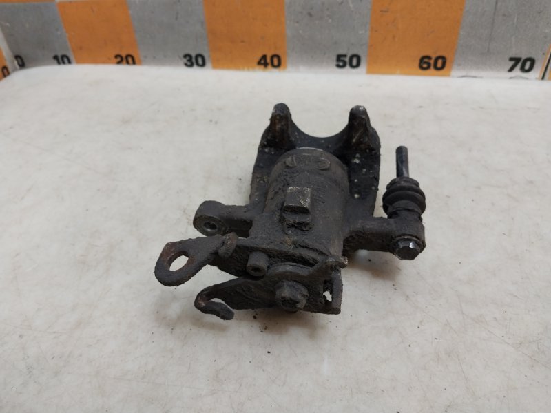 Суппорт задний левый