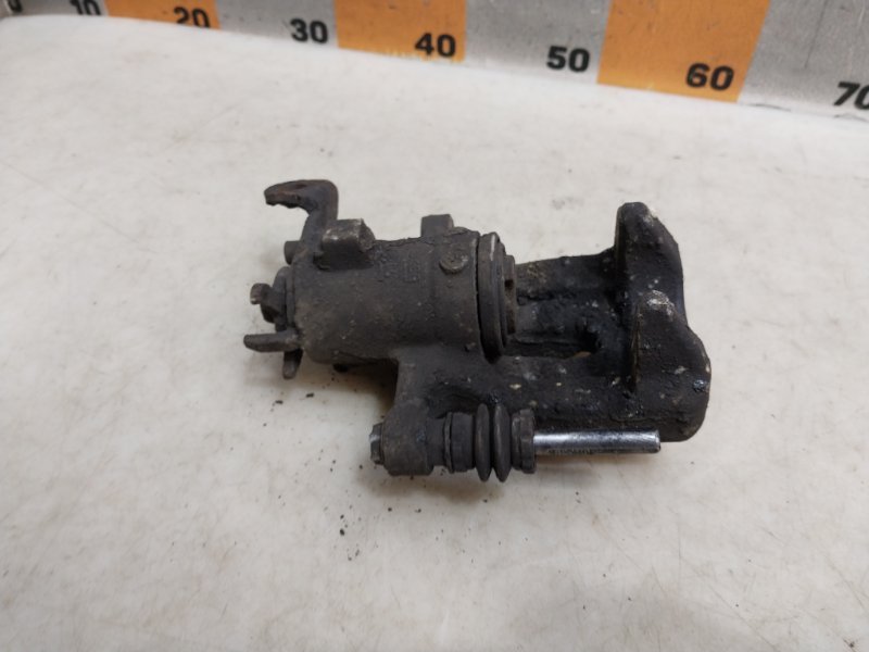 Суппорт задний левый