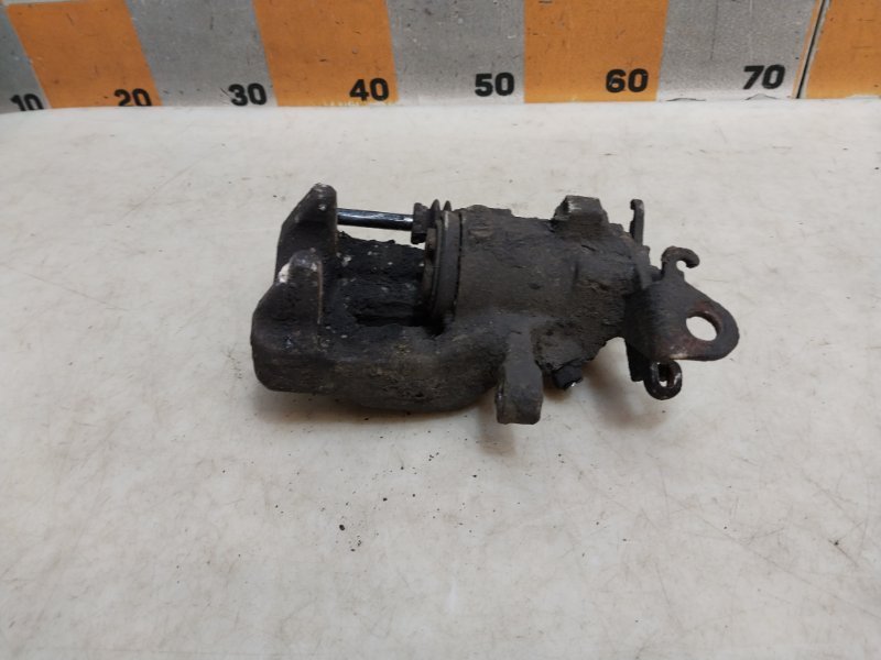 Суппорт задний левый