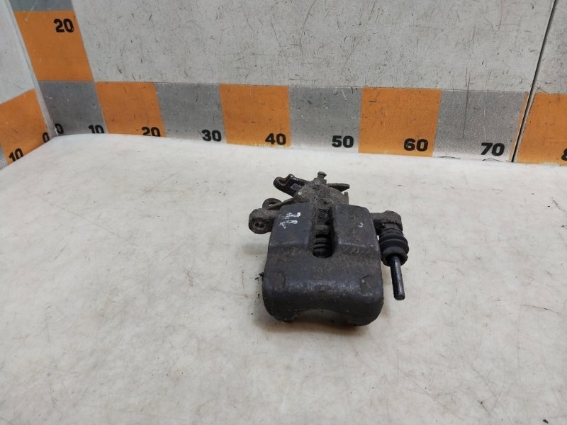 Суппорт задний левый