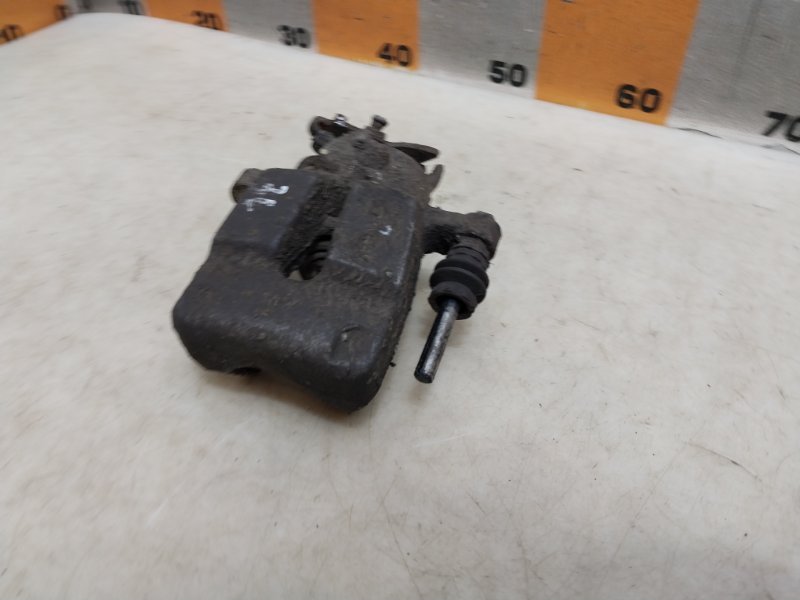 Суппорт задний левый