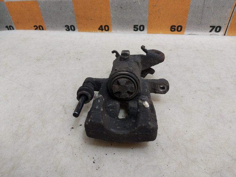 Суппорт задний левый