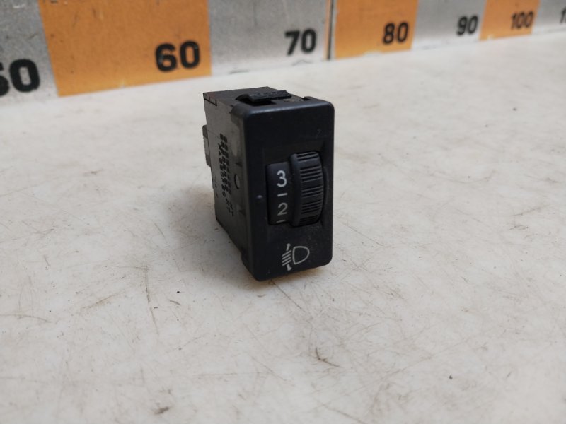 Кнопка корректора фар