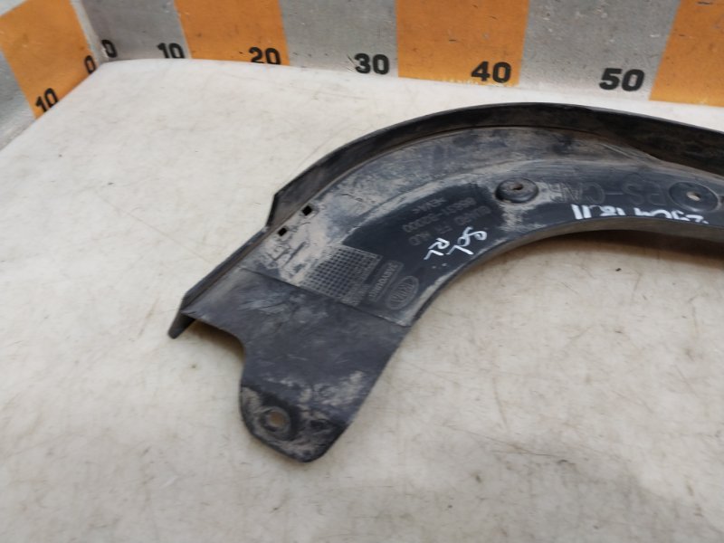 Брызговик передний левый