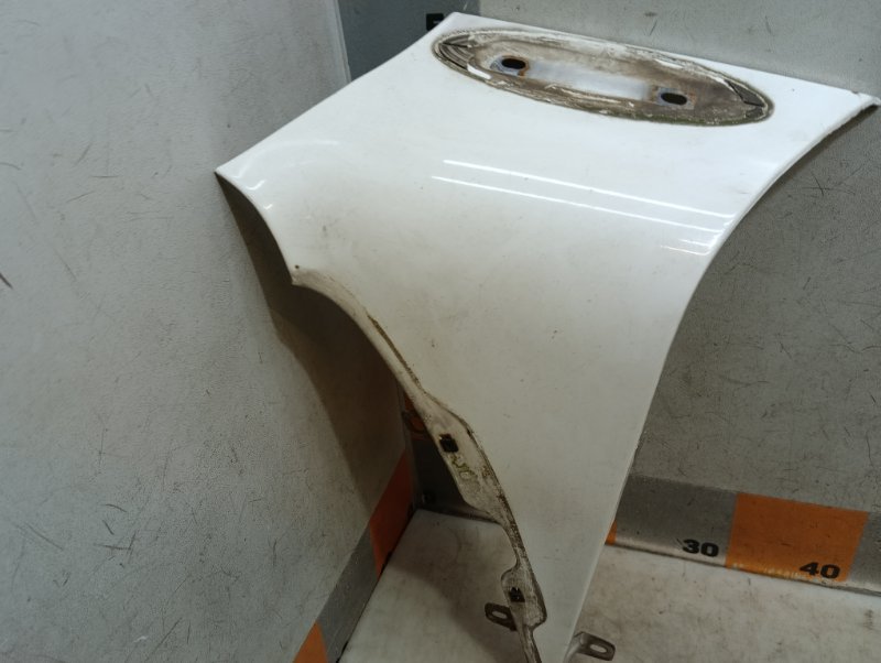 Накладка переднего крыла левого