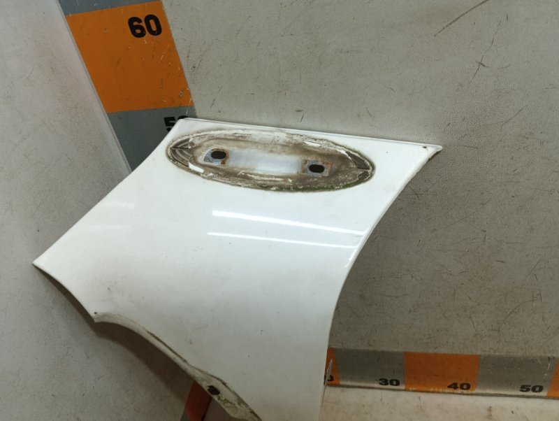 Накладка переднего крыла левого