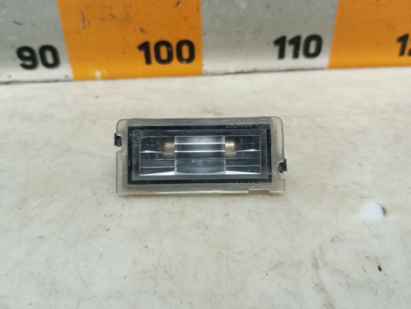 Фонарь подсветки номера