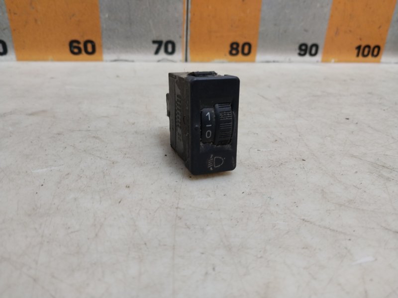 Кнопка корректора фар