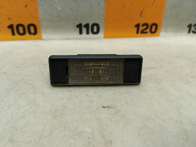 Фонарь подсветки номера