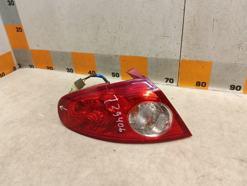 Фонарь задний левый