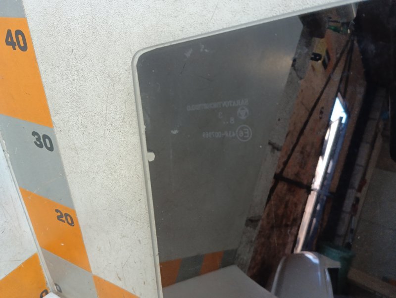 Стекло двери задней левой