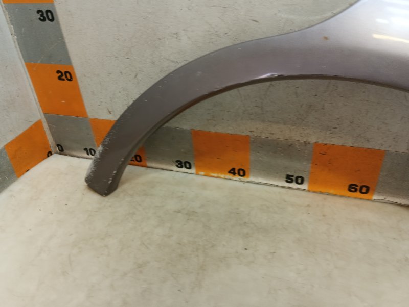 Накладка заднего крыла левого