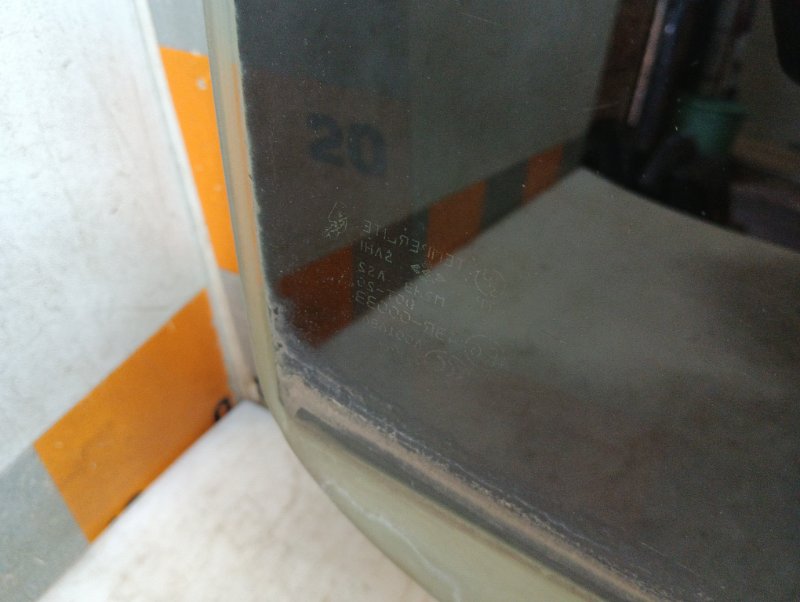 Стекло двери задней правой