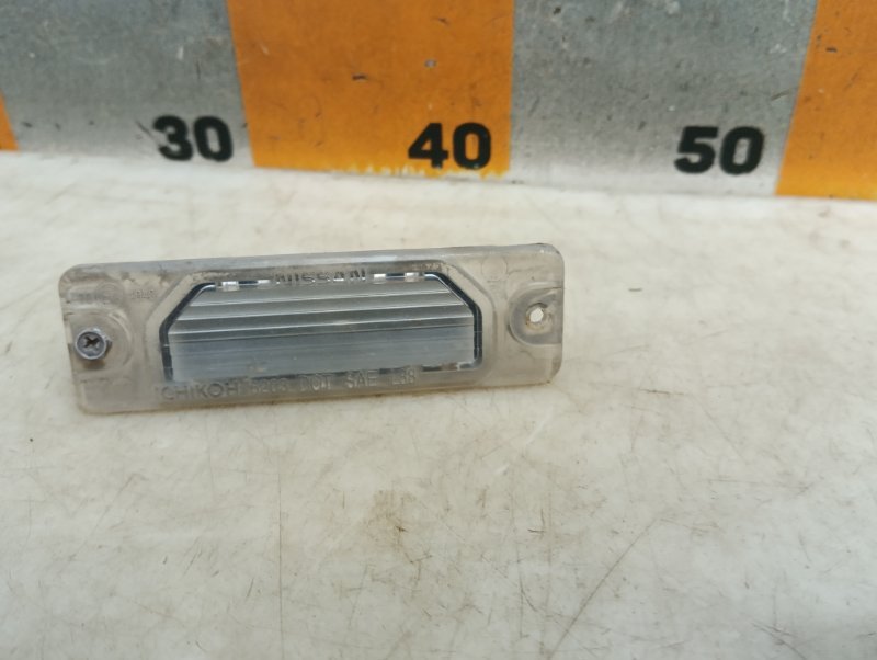 Фонарь подсветки номера