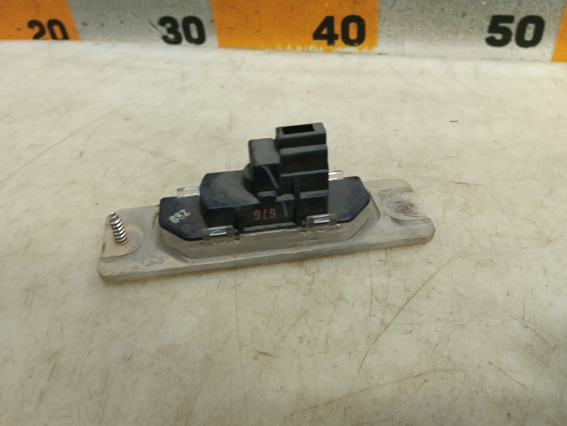 Фонарь подсветки номера