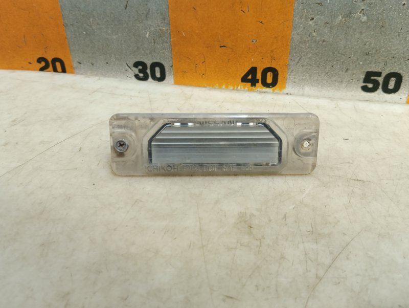 Фонарь подсветки номера