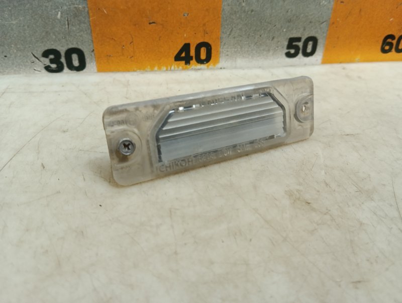 Фонарь подсветки номера