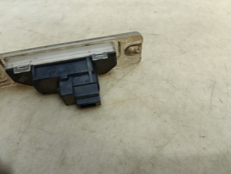 Фонарь подсветки номера